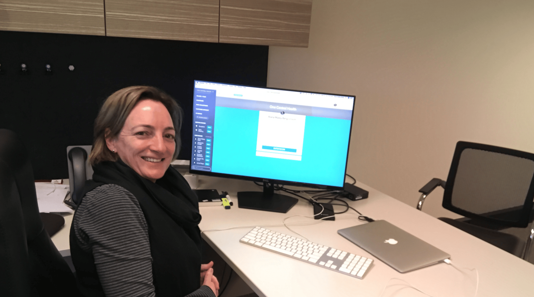 Alana Maley-Berg on her computer with Coviu open