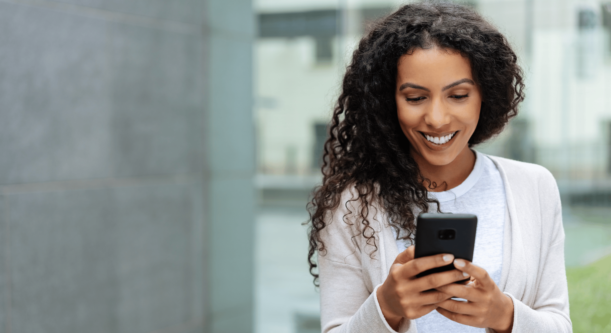Woman on phone for telehealth appointment