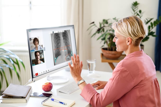 Lifestyle-image-woman-waving-computer